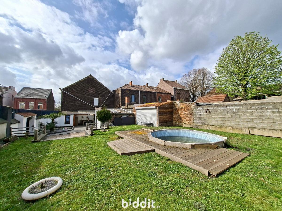 photo 17 du bien UNE MAISON D’HABITATION AVEC JARDIN ET GARAGE 