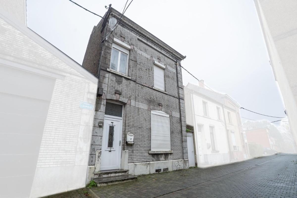 photo 1 du bien Maison de rangée avec passage latéral