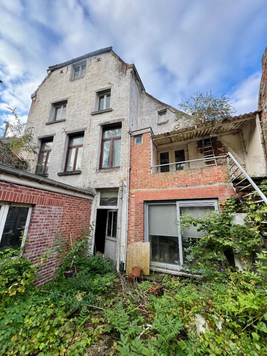 photo 4 du bien Très grande maison d'habitation et/ou commerce avec jardin 