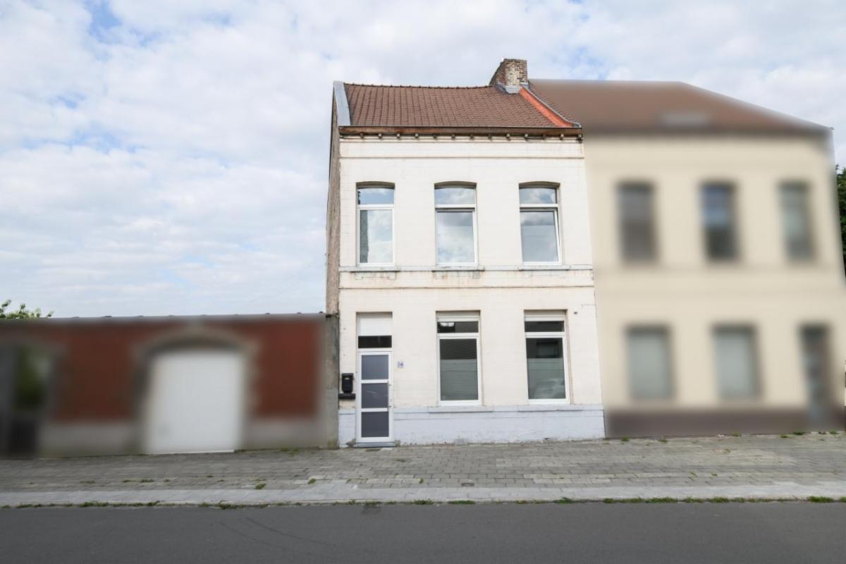 Maison d’habitation unifamiliale 2 façades avec jardin