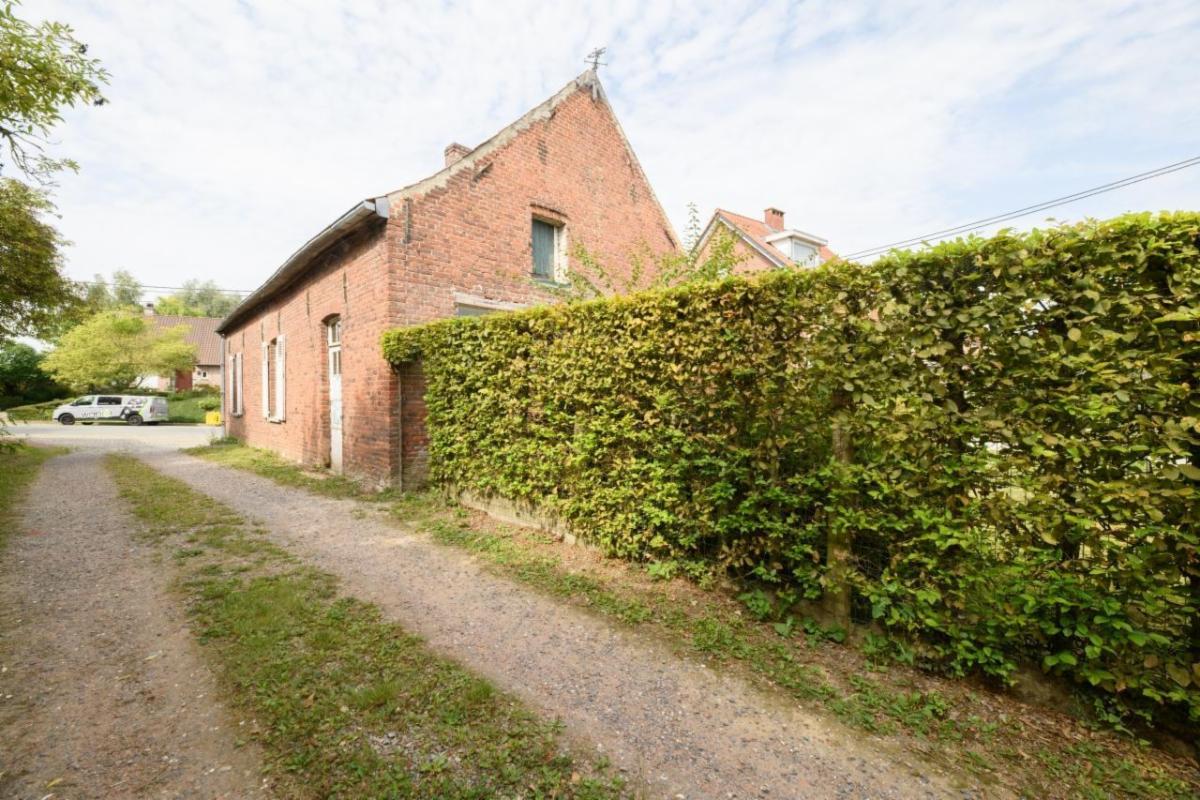 Maison d’habitation à rénover située à proximité du centre
