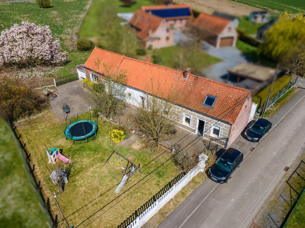 Maison style longère avec jardin, vergers, prairie sur 56a.