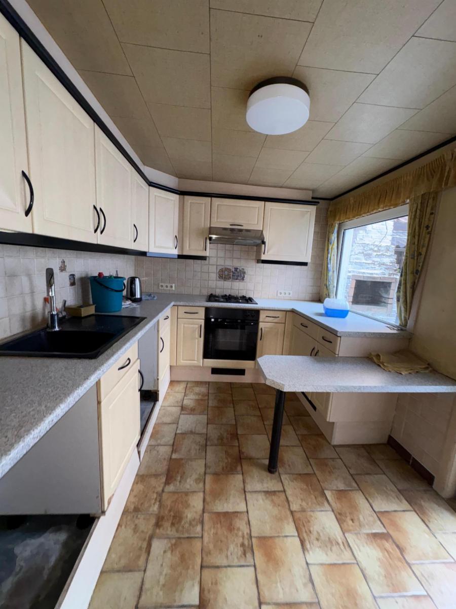 photo 7 du bien Maison 2 façades avec 3 chambres et cour.