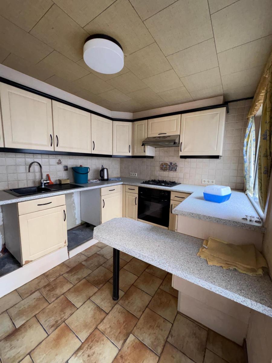 photo 8 du bien Maison 2 façades avec 3 chambres et cour.