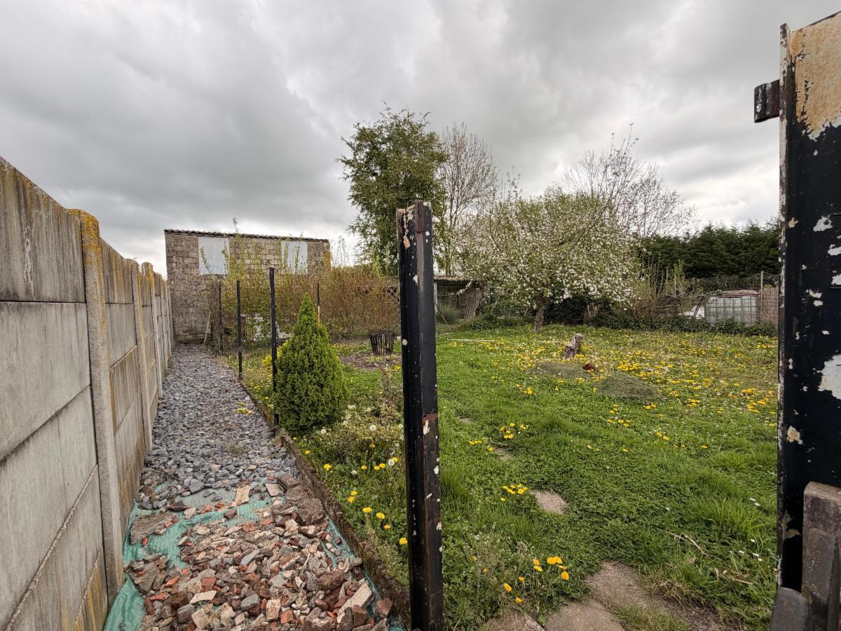 photo 4 du bien Maison avec jardin sur environ 7a 48ca et garage séparé 