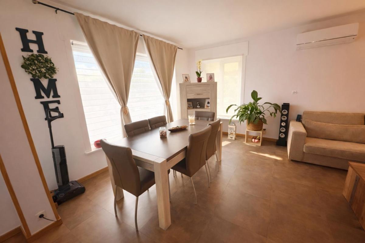 photo 2 du bien Maison individuelle lumineuse avec beau jardin 