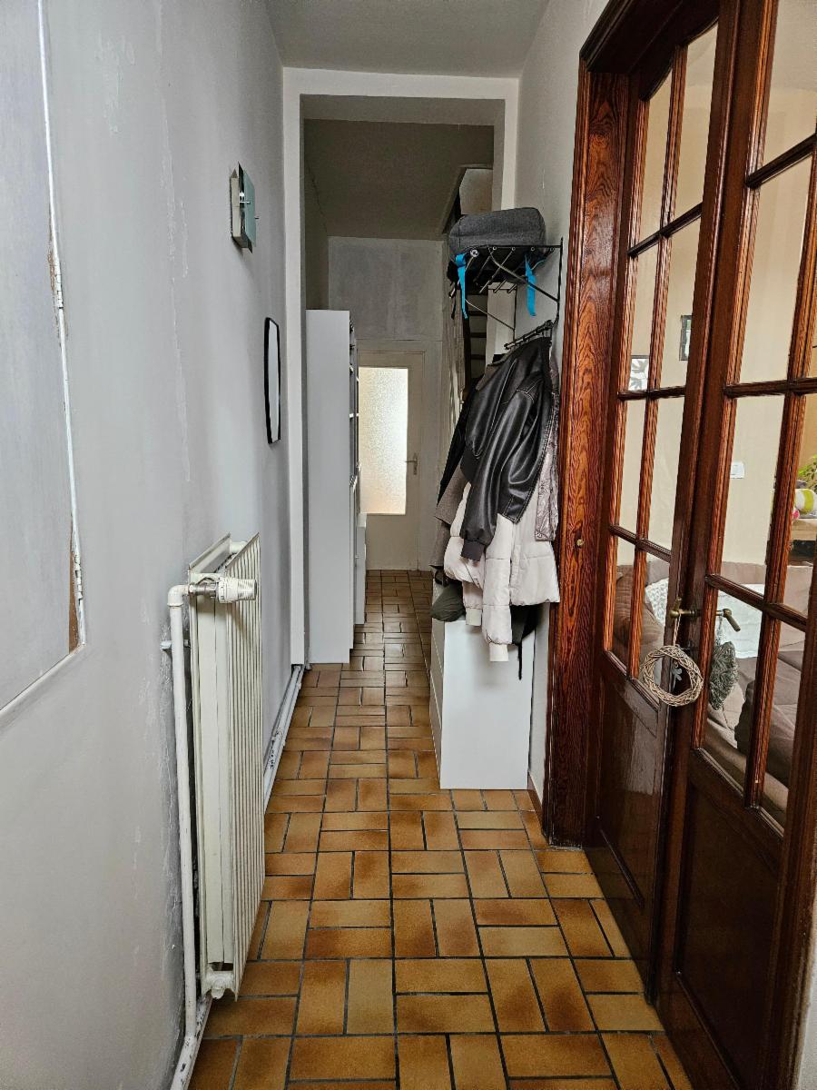 photo 4 du bien Maison 3 façades - 3 chambres - 2 garages - beau jardin