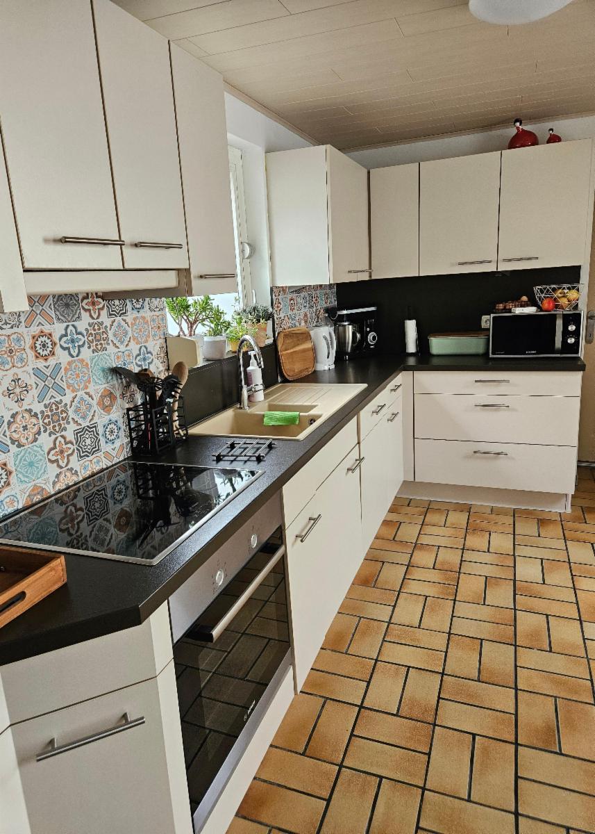 photo 7 du bien Maison 3 façades - 3 chambres - 2 garages - beau jardin