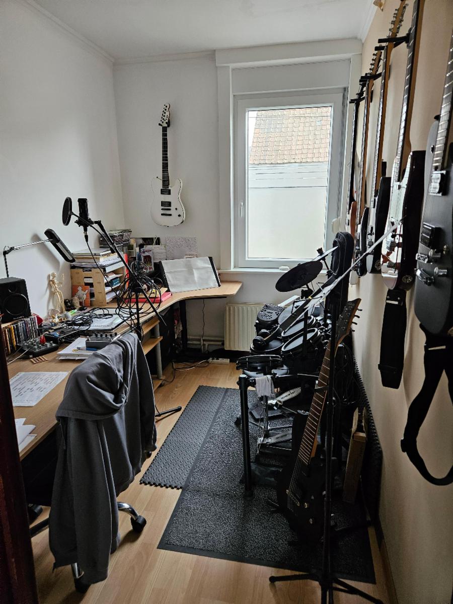 photo 11 du bien Maison 3 façades - 3 chambres - 2 garages - beau jardin