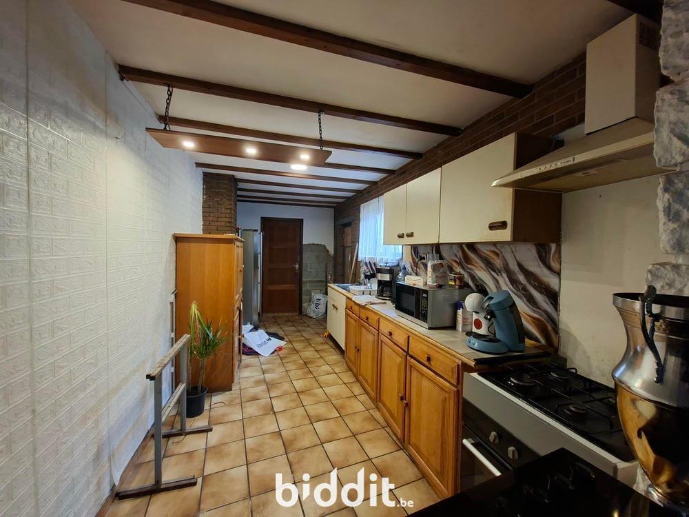 photo 5 du bien UNE MAISON D’HABITATION AVEC JARDIN 