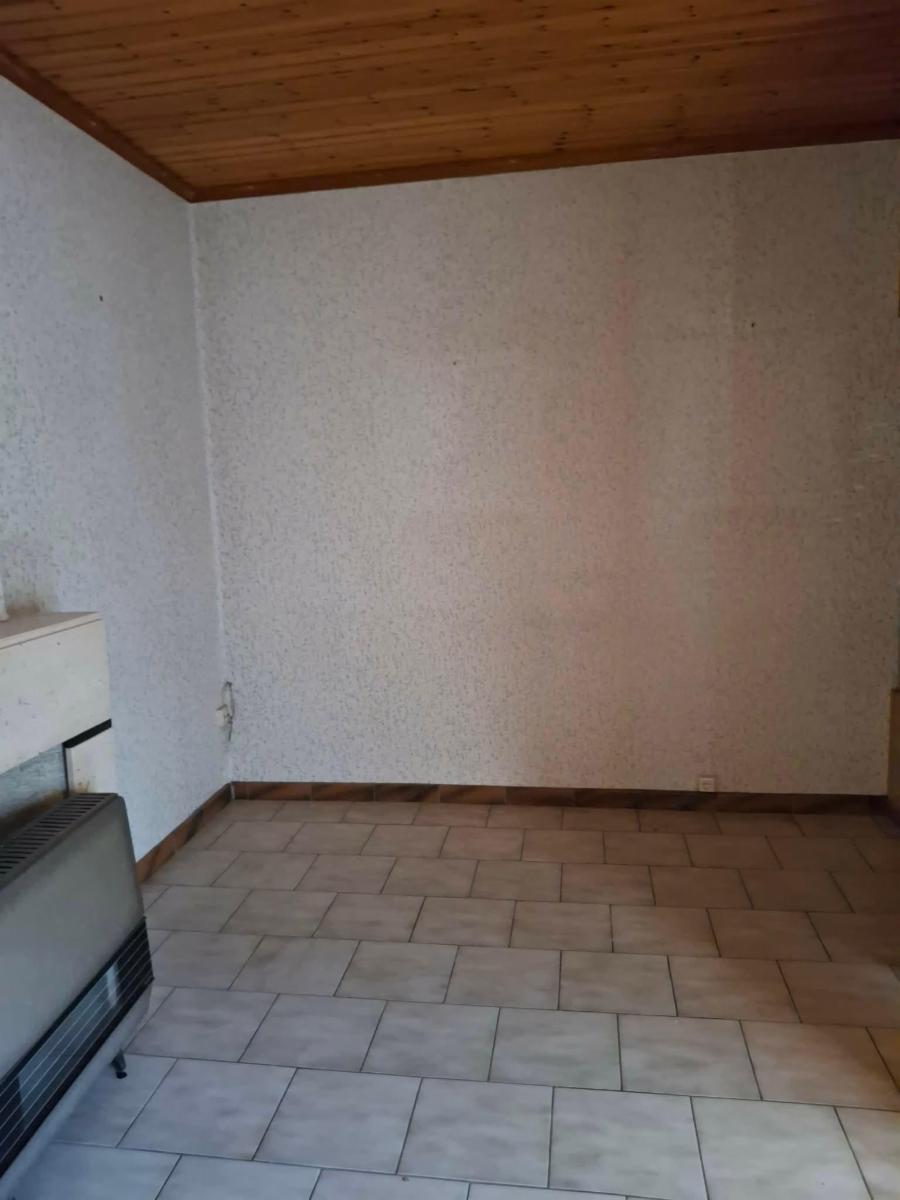 photo 4 du bien Maison avec garage et jardin à restaurer