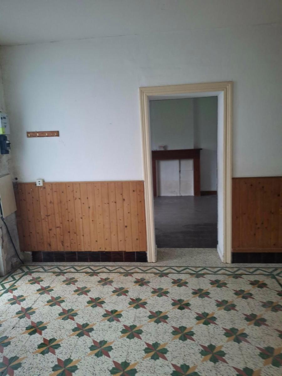 photo 9 du bien Maison à restaurer dans quartier au calme - beau potentiel
