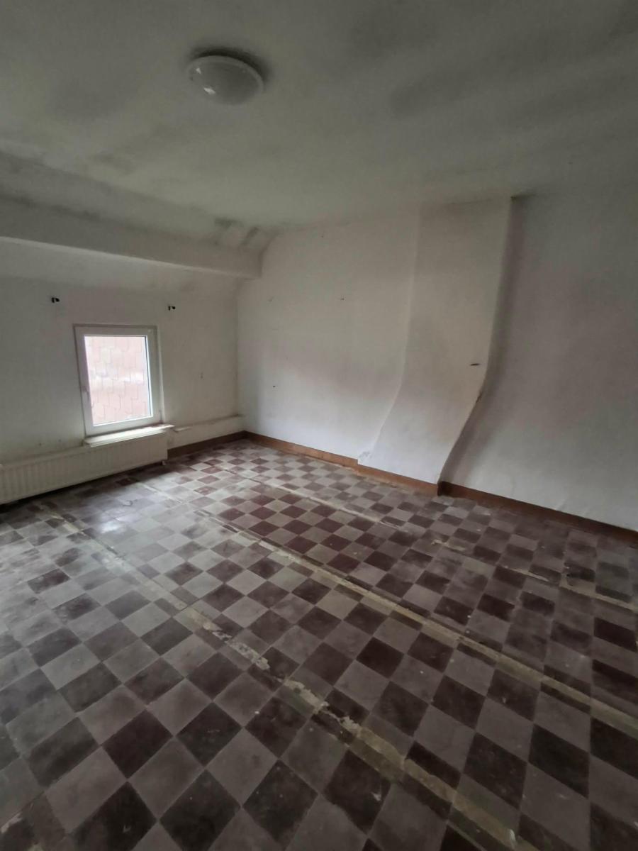photo 16 du bien Maison à restaurer dans quartier au calme - beau potentiel