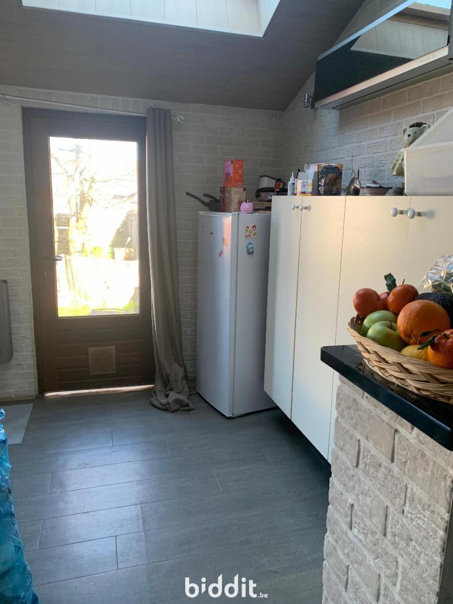 photo 11 du bien Maison 3 façades avec jardin et garage à La Louvière.