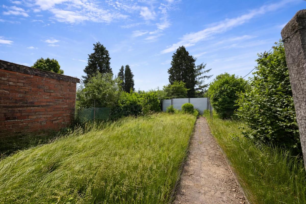 photo 14 du bien MAISON 2 FAÇADES AVEC PASSAGE LATÉRAL ET JARDIN