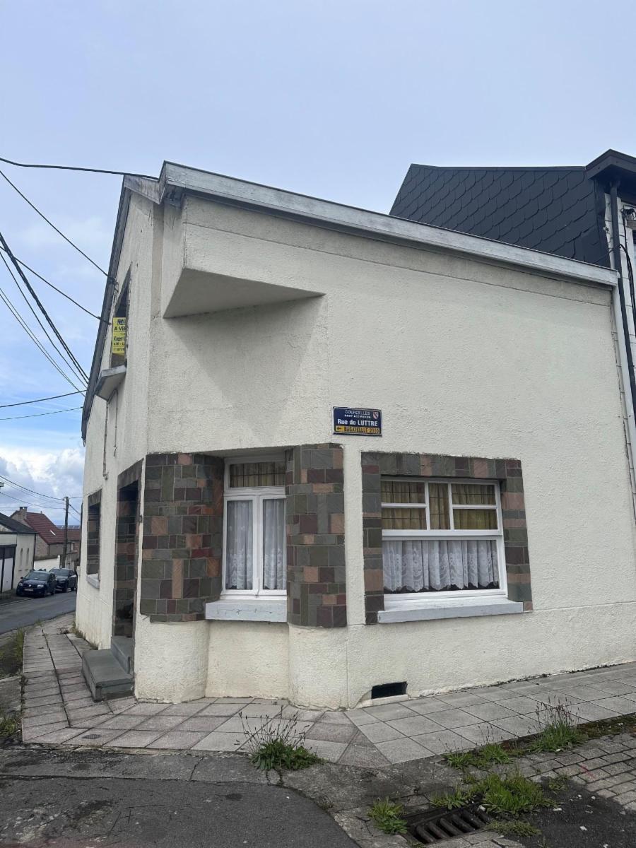 photo 2 du bien Maison avec cour et garage.