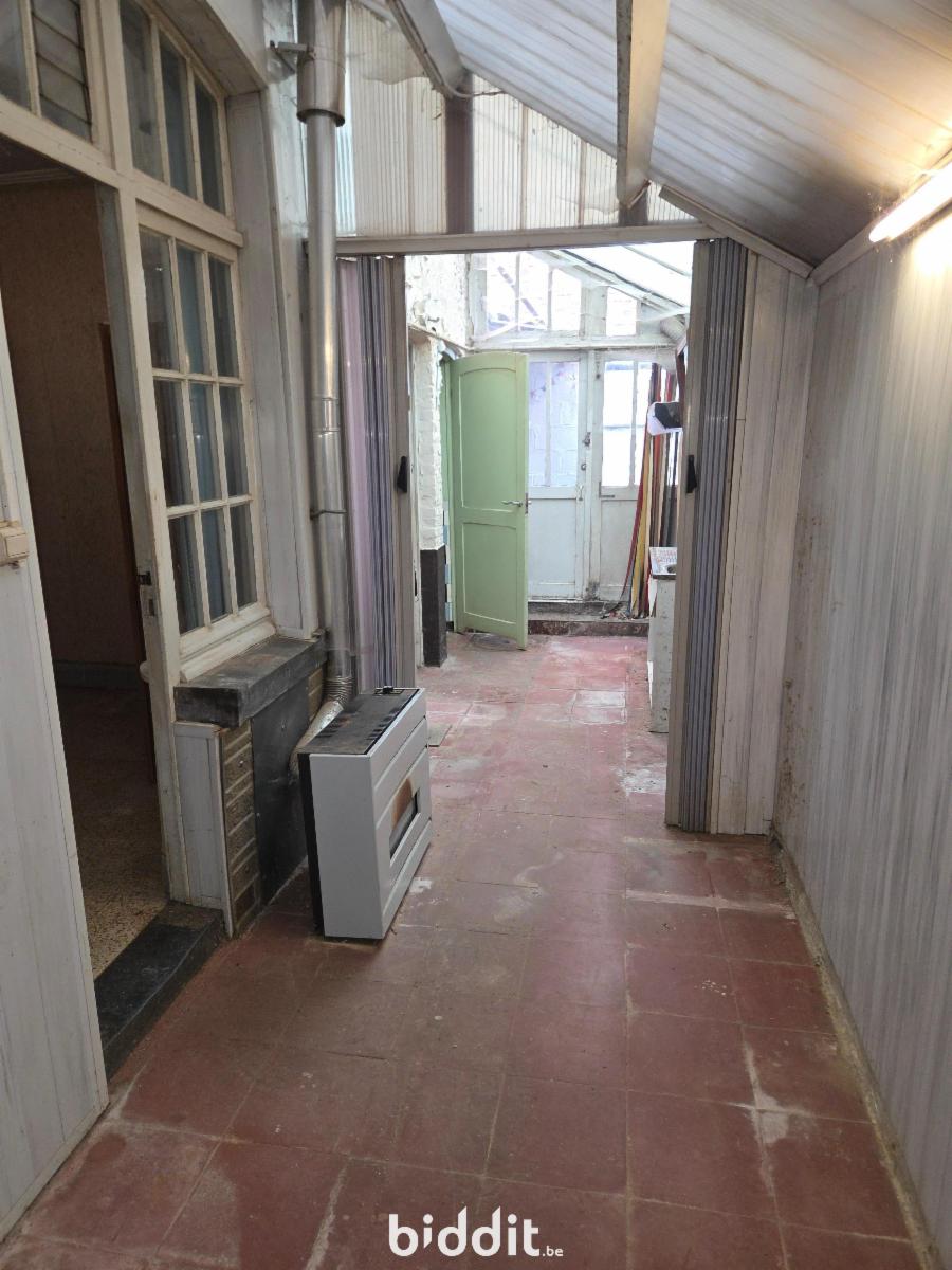 photo 10 du bien Maison à rénover avec garage.