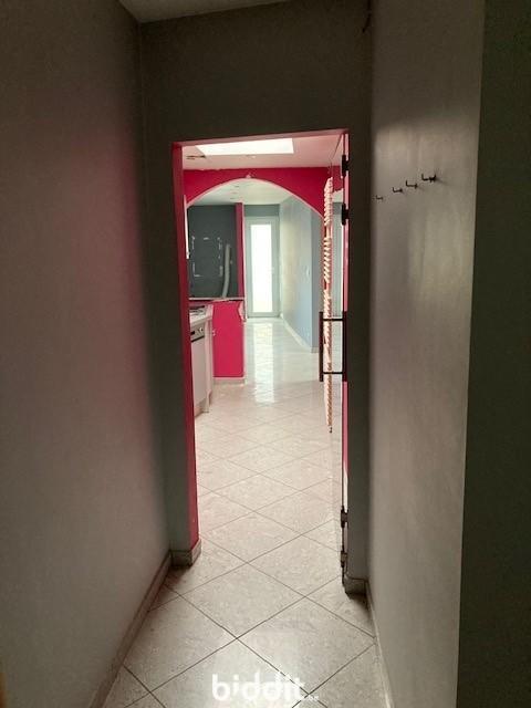 photo 5 du bien Immeuble avec caves,garage,appartement,combles aménageables 