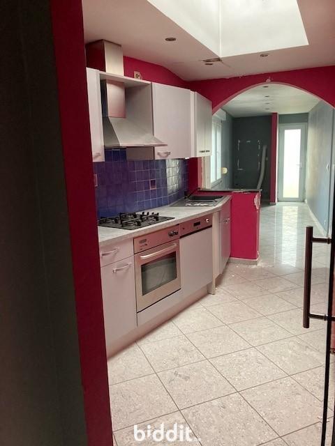 photo 6 du bien Immeuble avec caves,garage,appartement,combles aménageables 