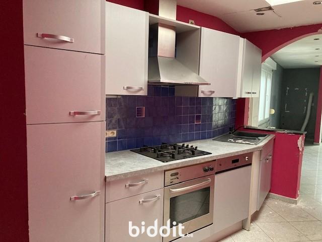 photo 7 du bien Immeuble avec caves,garage,appartement,combles aménageables 