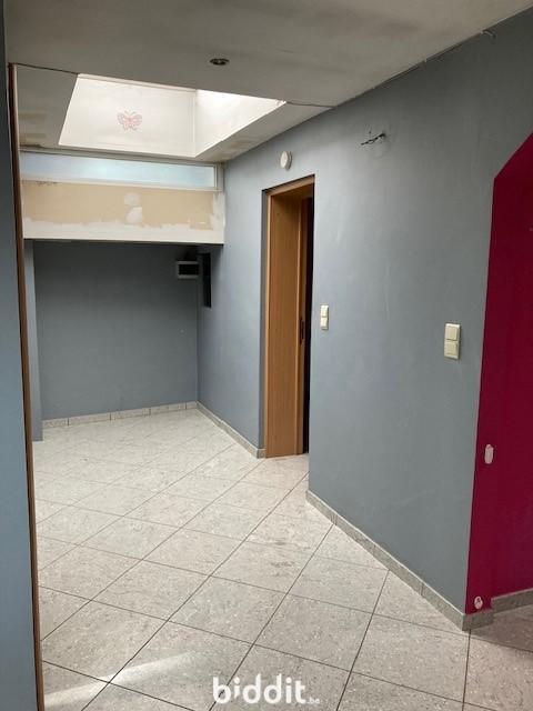 photo 8 du bien Immeuble avec caves,garage,appartement,combles aménageables 