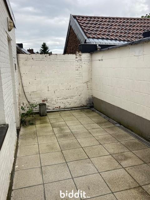 photo 10 du bien Immeuble avec caves,garage,appartement,combles aménageables 