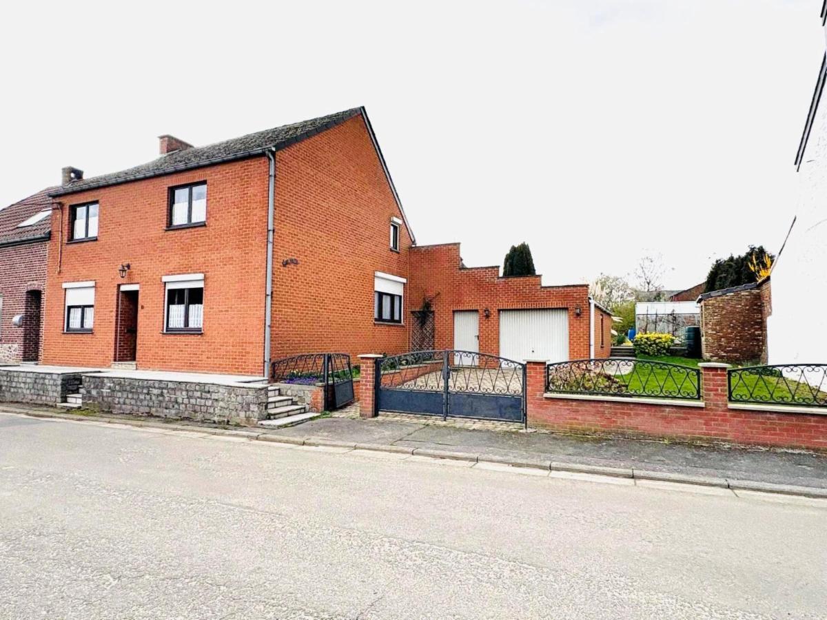 Maison d'habitation 3 façades avec garage et jardin