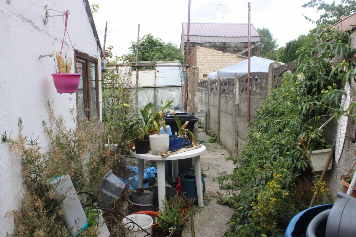 Photo 3 du bien Petite maison louée avec garage et jardin