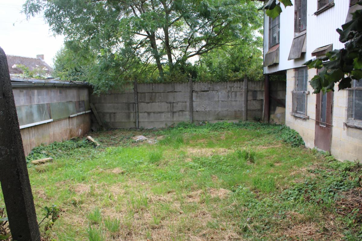 Photo 8 du bien Maison 3 façades avec garage et jardin