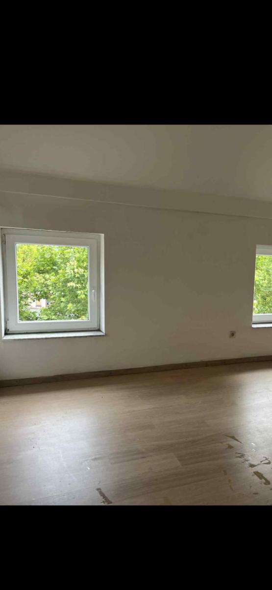 Photo 10 du bien Maison de rapport avec 2 rez-commerciaux et 2 apparts loués